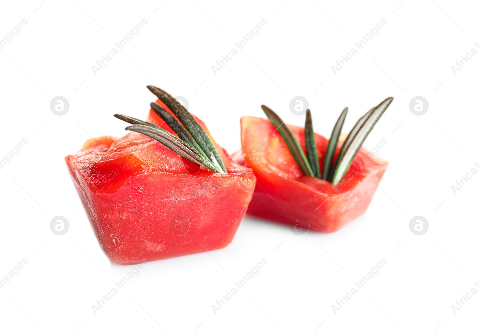 Photo of Tasty tomato ice cubes on white background