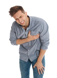Photo of Man suffering from chest pain on white background