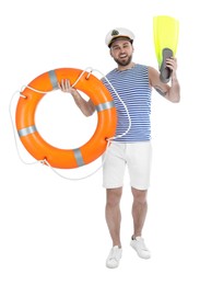 Photo of Sailor with ring buoy and swim fins on white background