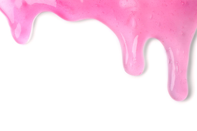 Photo of Flowing pink slime on white background. Antistress toy