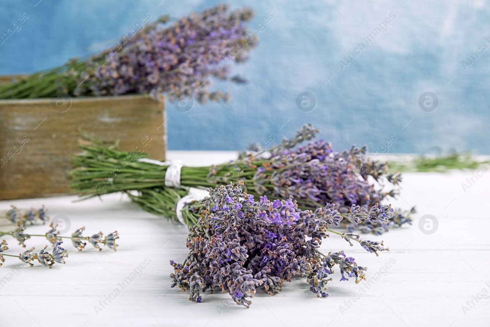 Photo of Composition with blooming lavender flowers on table