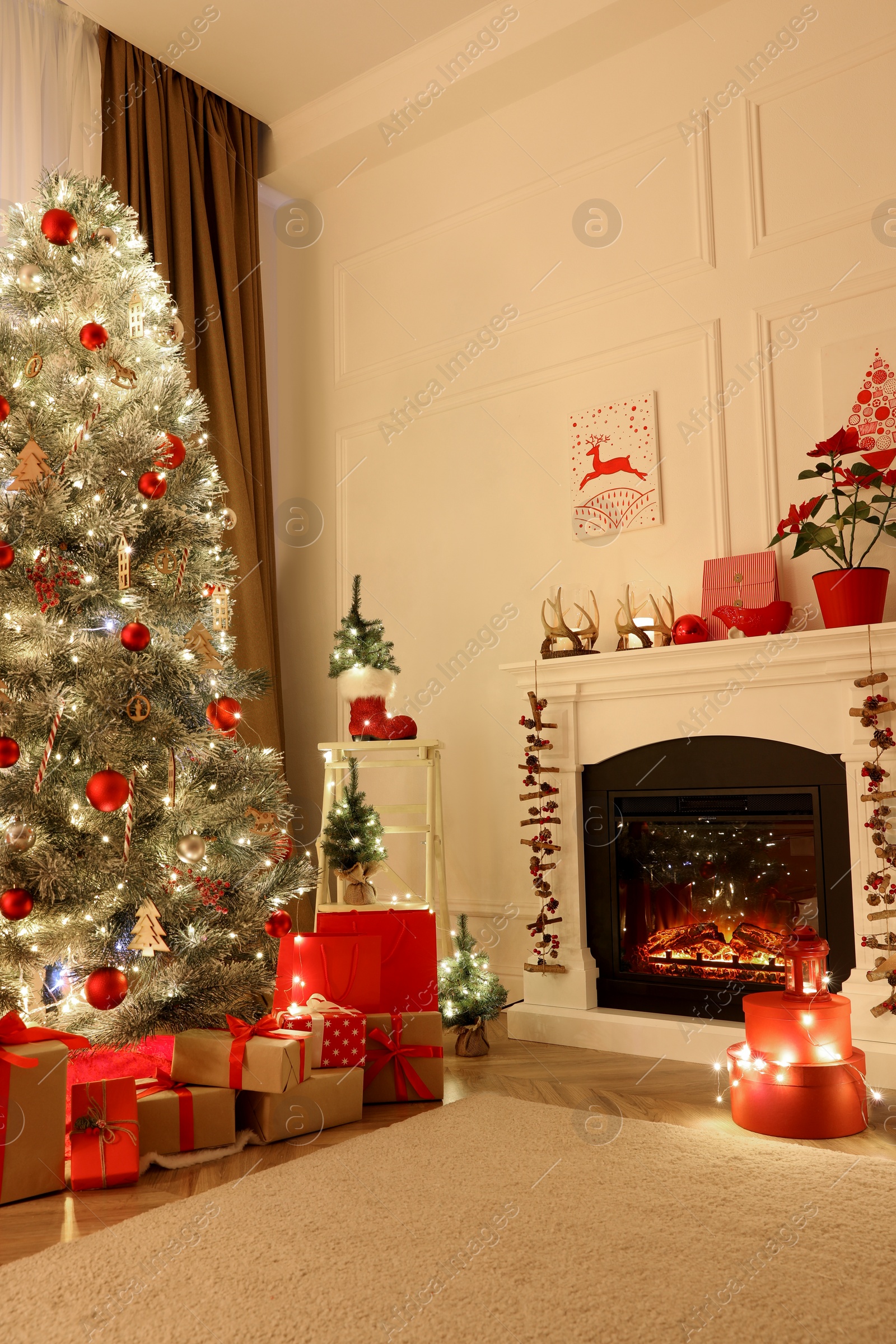 Photo of Living room with fireplace and Christmas decorations. Festive interior design