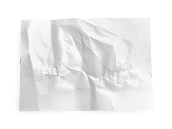 Photo of Crumpled sheet of paper on white background, top view