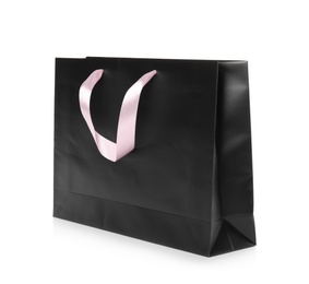 Photo of Paper shopping bag isolated on white. Mock up for design