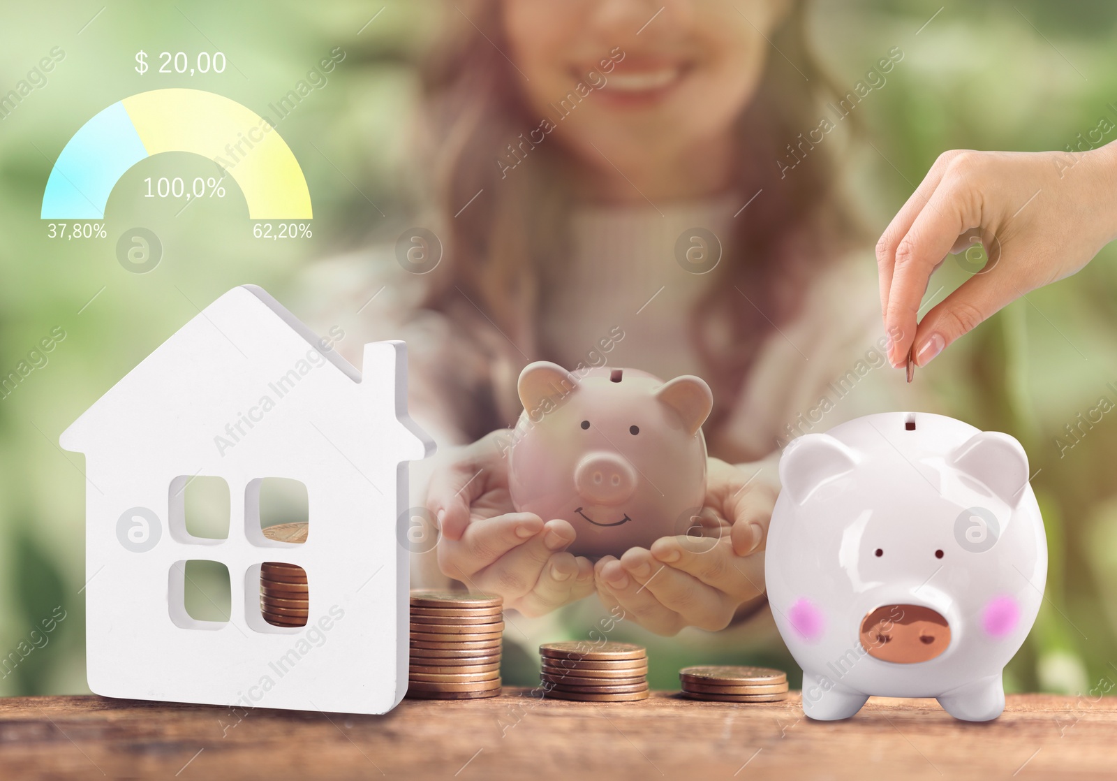 Image of Woman putting coins into piggy bank at table, closeup. Collecting money to buy house