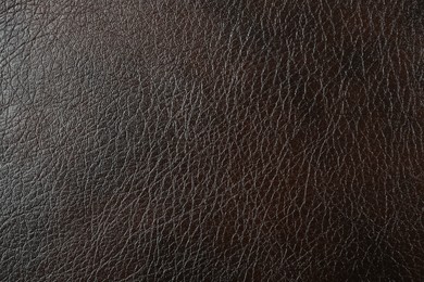 Texture of brown leather as background, top view