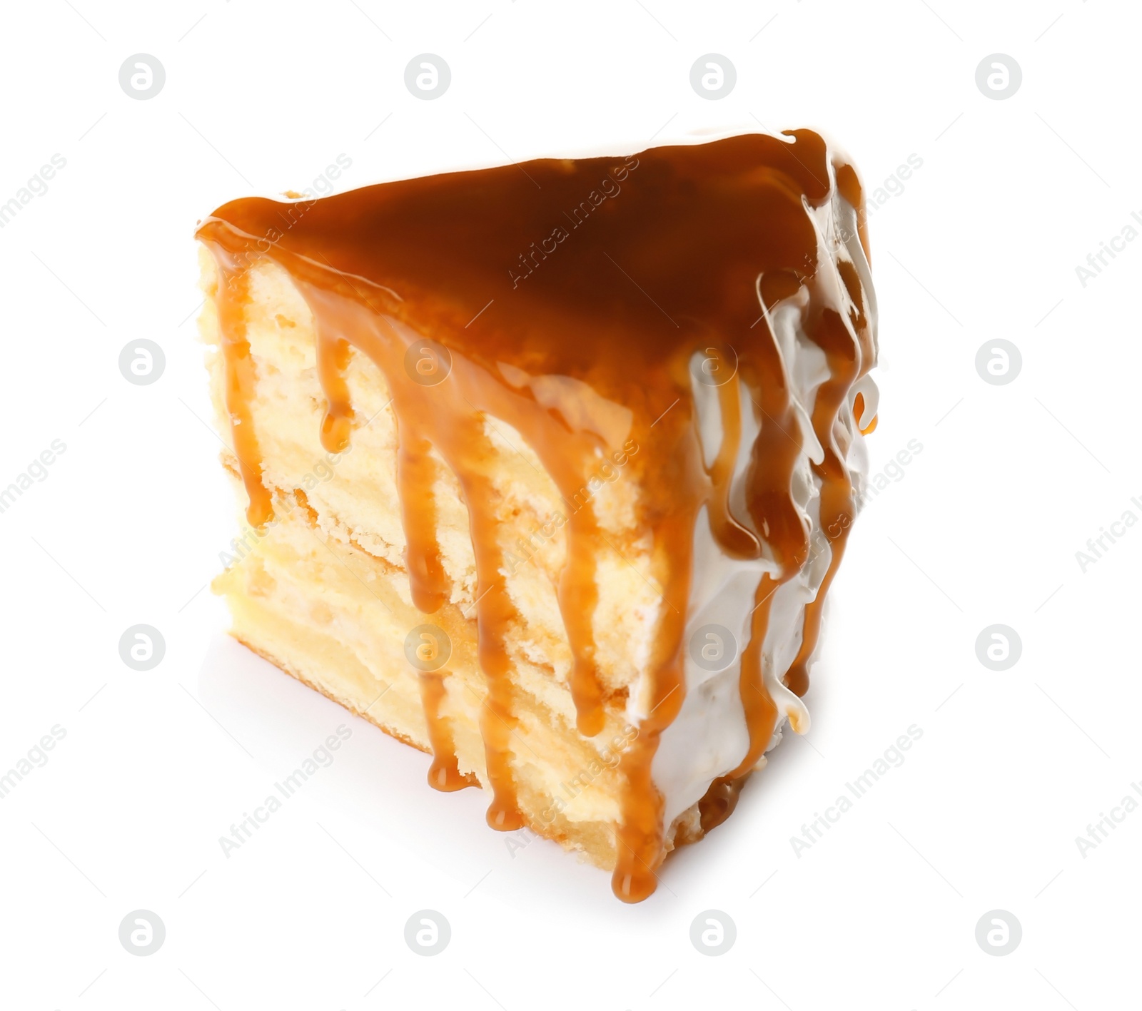 Photo of Piece of delicious homemade cake with caramel sauce white background