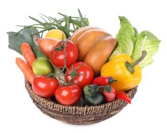 Fresh ripe vegetables and fruits in wicker bowl on white background