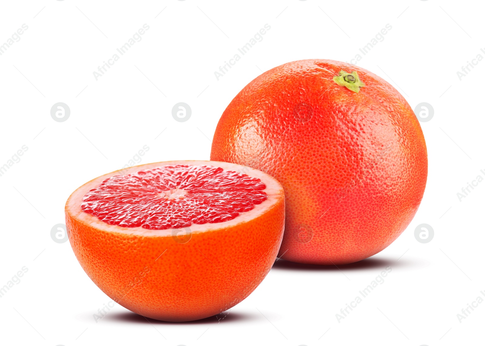 Image of Fresh whole and cut grapefruits isolated on white