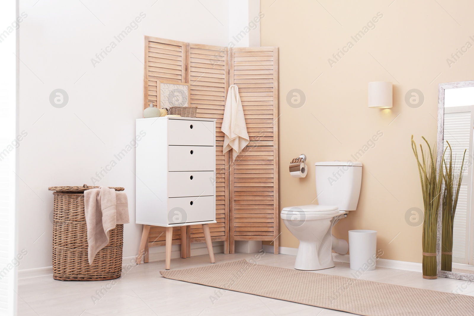 Photo of Toilet bowl in modern bathroom interior