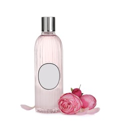 Photo of Stylish bottle with cosmetic product and flowers on white background