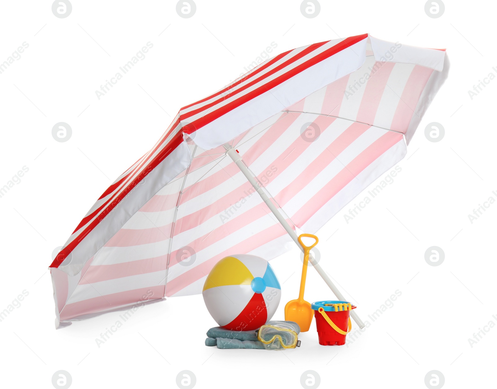 Photo of Beach umbrella, inflatable ball, towel and child's sand toys on white background