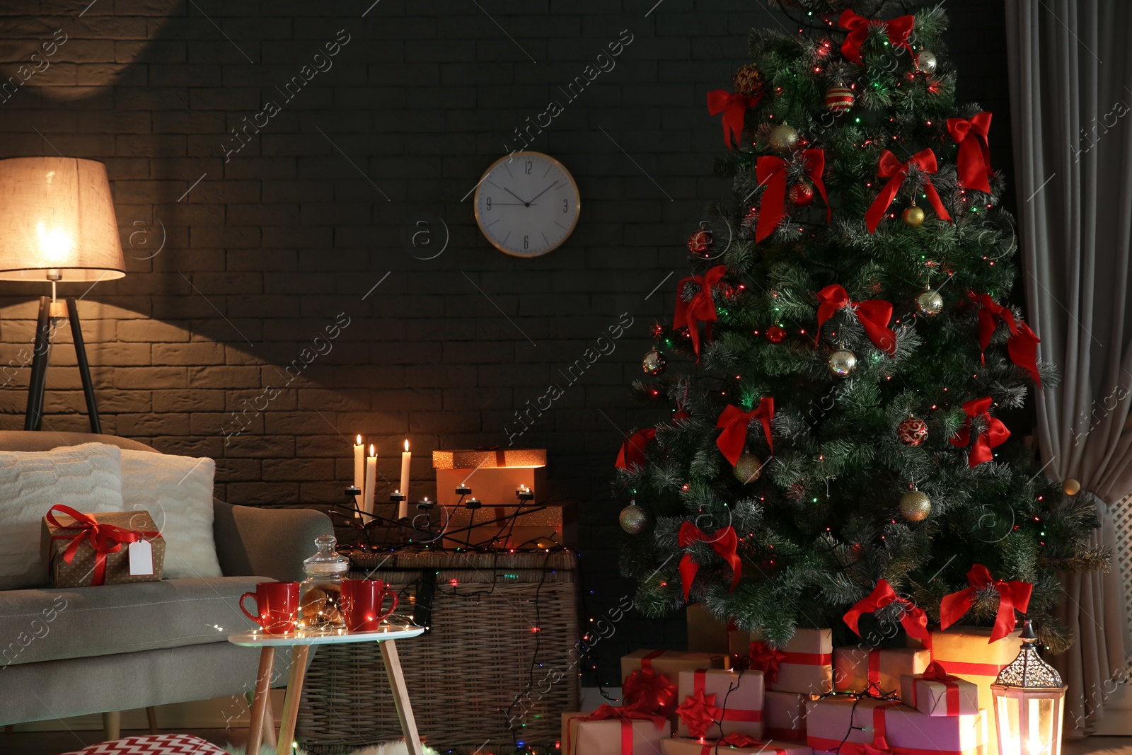 Photo of Stylish room interior with decorated Christmas tree