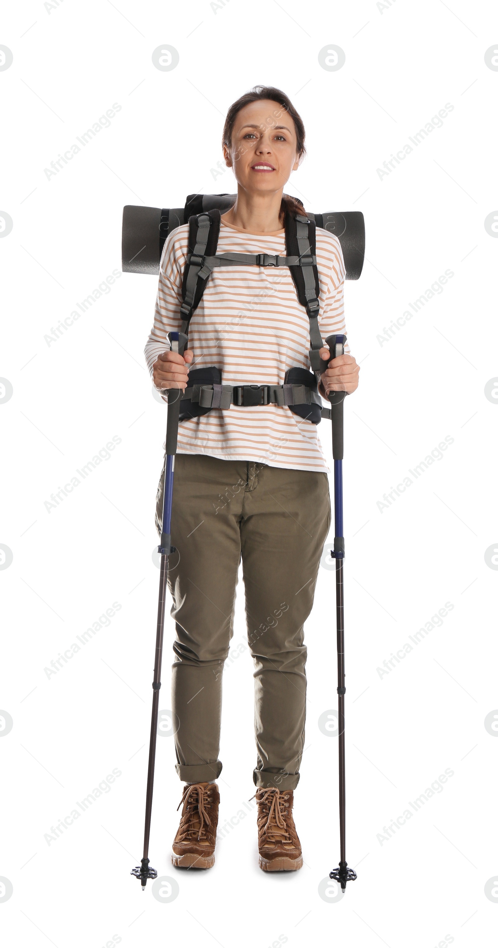 Photo of Female hiker with backpack and trekking poles on white background