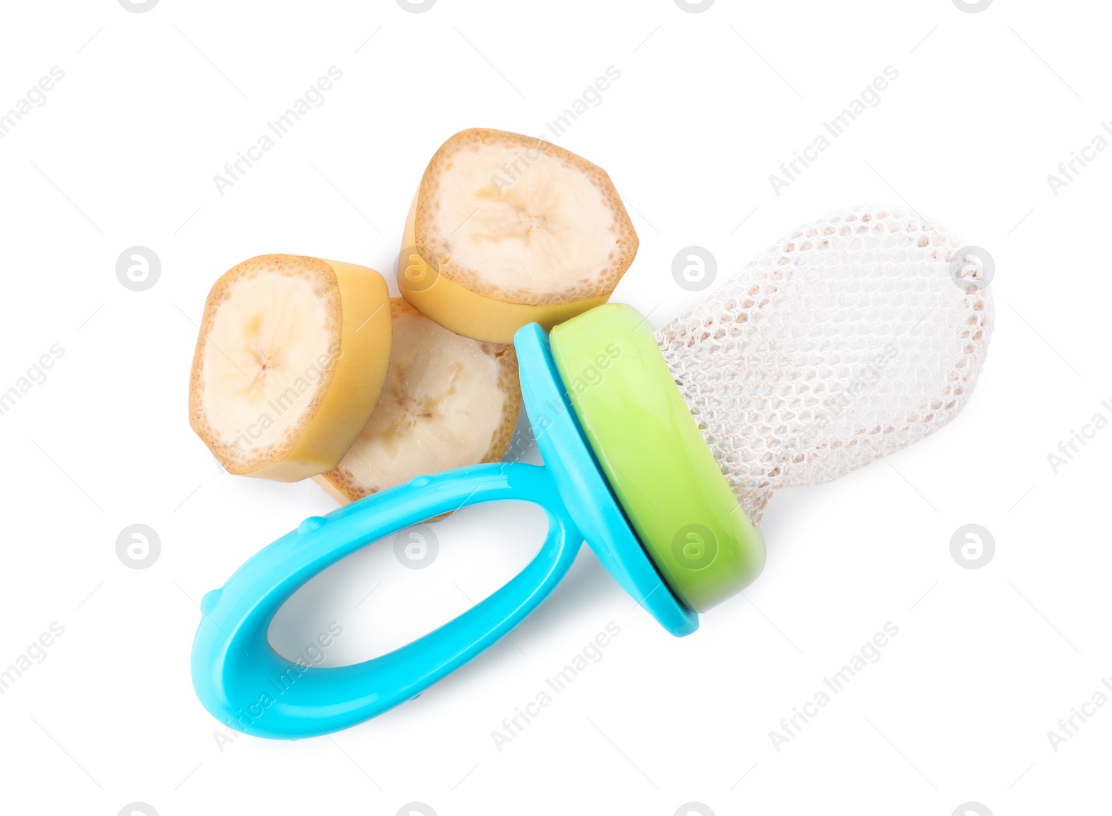 Photo of Empty nibbler and cut banana on white background, top view. Baby feeder