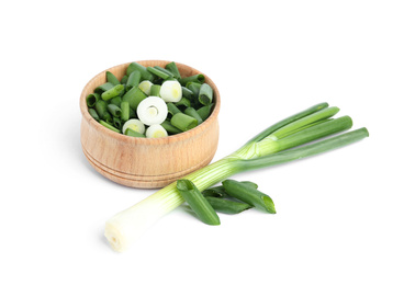 Fresh green spring onions isolated on white