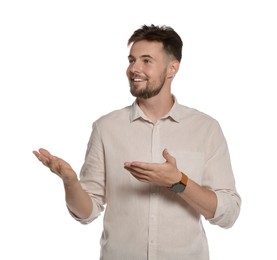 Photo of Handsome young man gesturing on white background