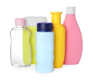 Photo of Bottles of baby cosmetic products on white background