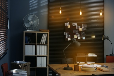 Detective office interior with evidence board on wall