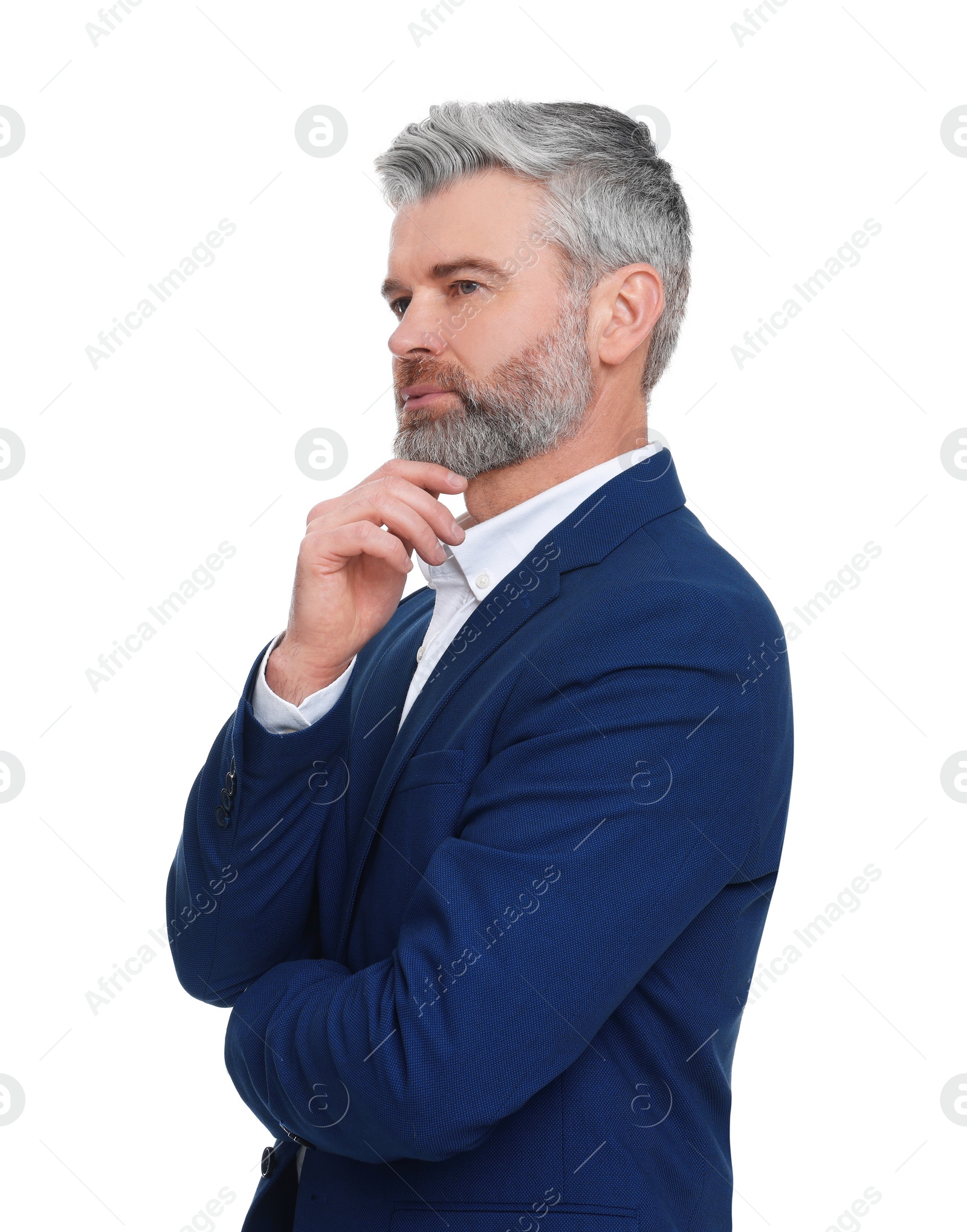 Photo of Mature businessman in stylish clothes posing on white background