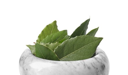 Photo of Bowl with bay leaves on white background, closeup