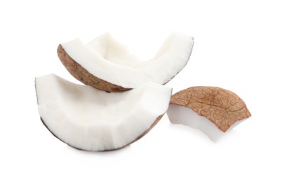 Photo of Pieces of ripe coconut on white background