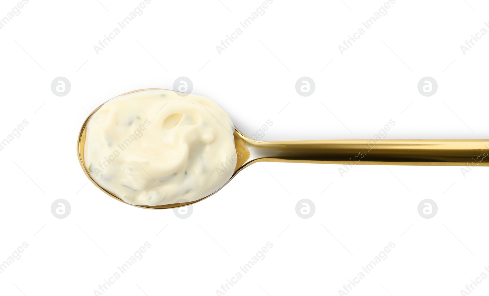 Photo of Tartar sauce in spoon isolated on white, top view