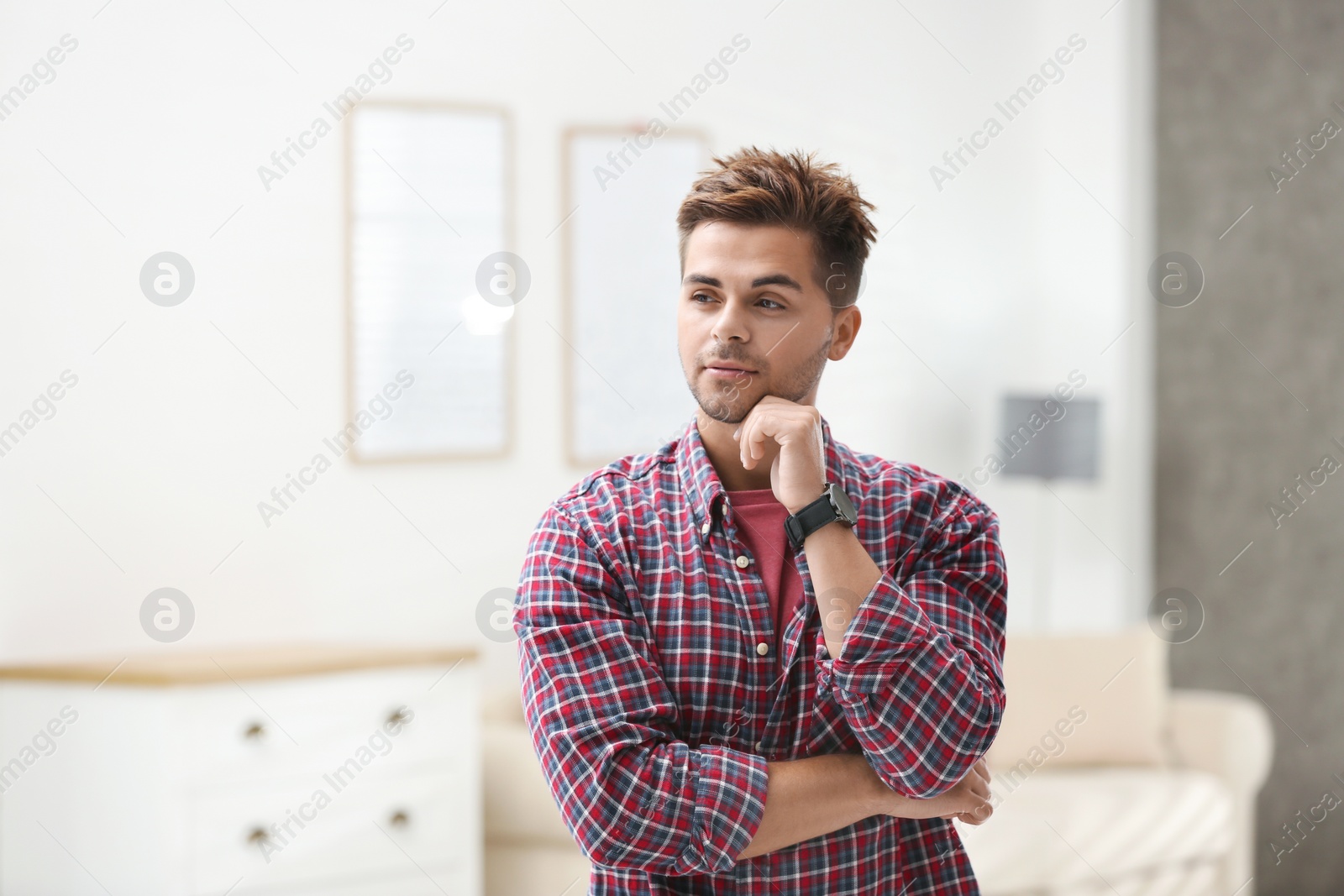 Photo of Portrait of handsome young man in room