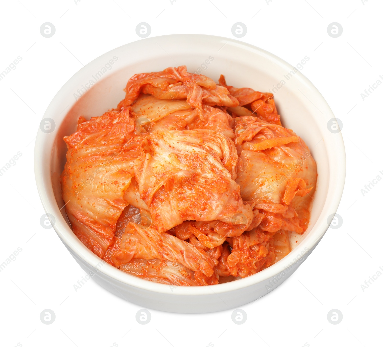 Photo of Bowl of spicy cabbage kimchi isolated on white