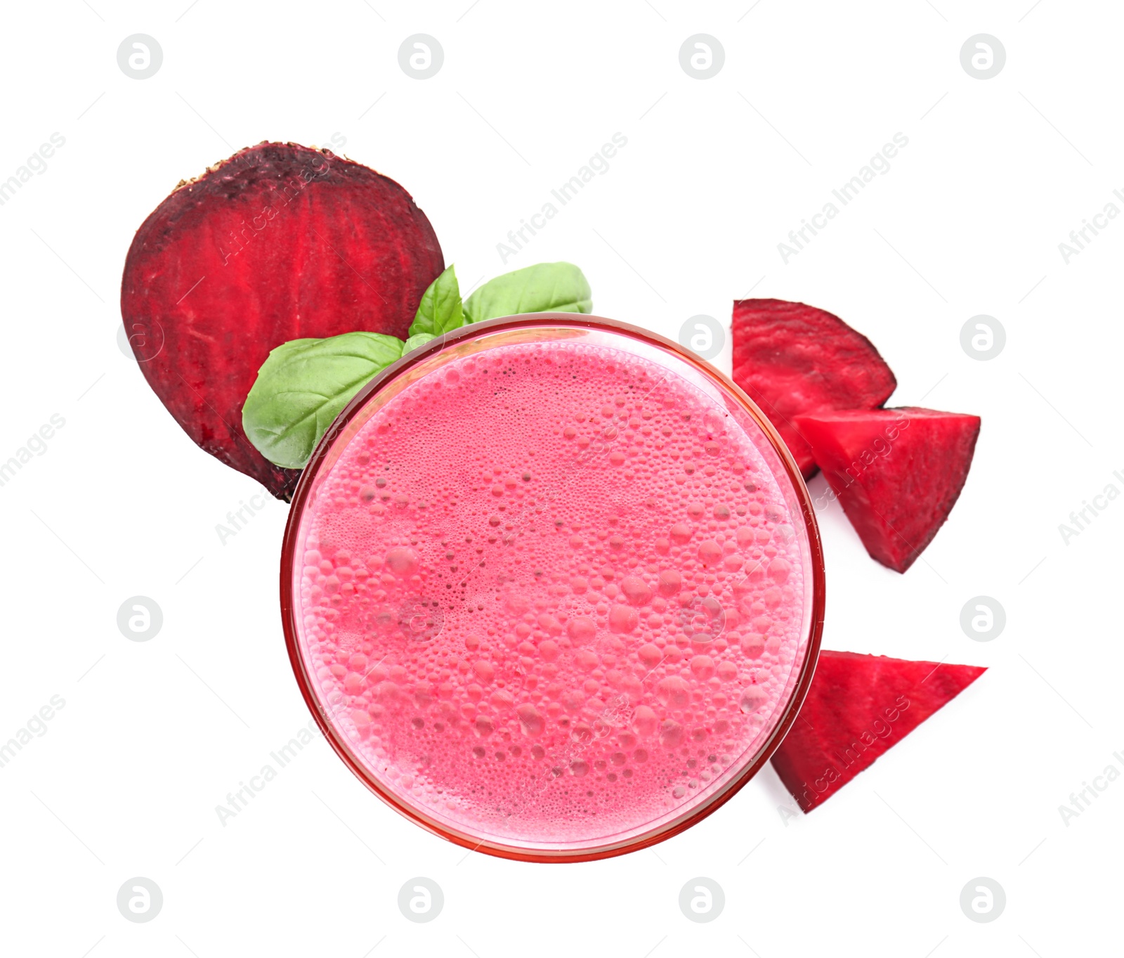 Photo of Glass with healthy detox smoothie and beet on white background, top view