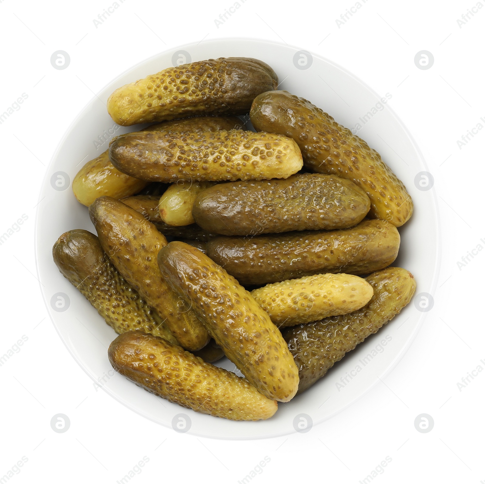 Photo of Tasty pickled cucumbers in bowl isolated on white, top view