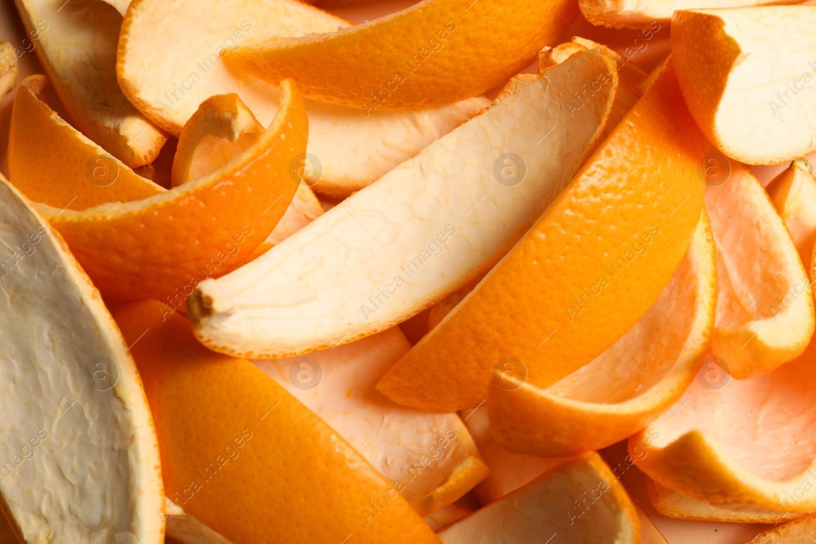 Photo of Many orange peels preparing for drying as background, closeup