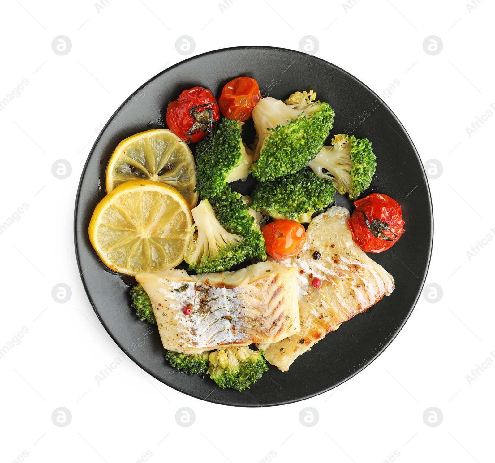 Photo of Tasty cod cooked with vegetables isolated on white, top view