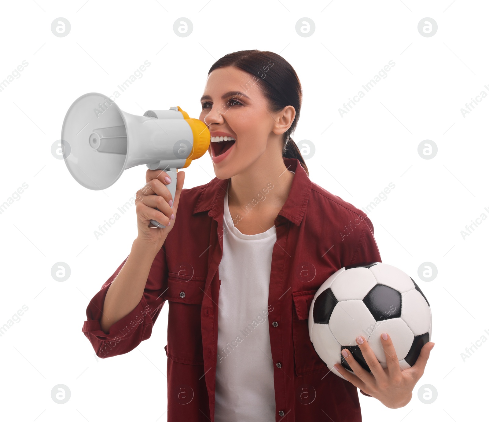 Photo of Emotional sports fan with soccer ball and megaphone on white background