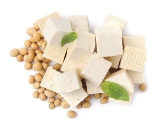 Delicious tofu cheese, basil and soybeans isolated on white, top view