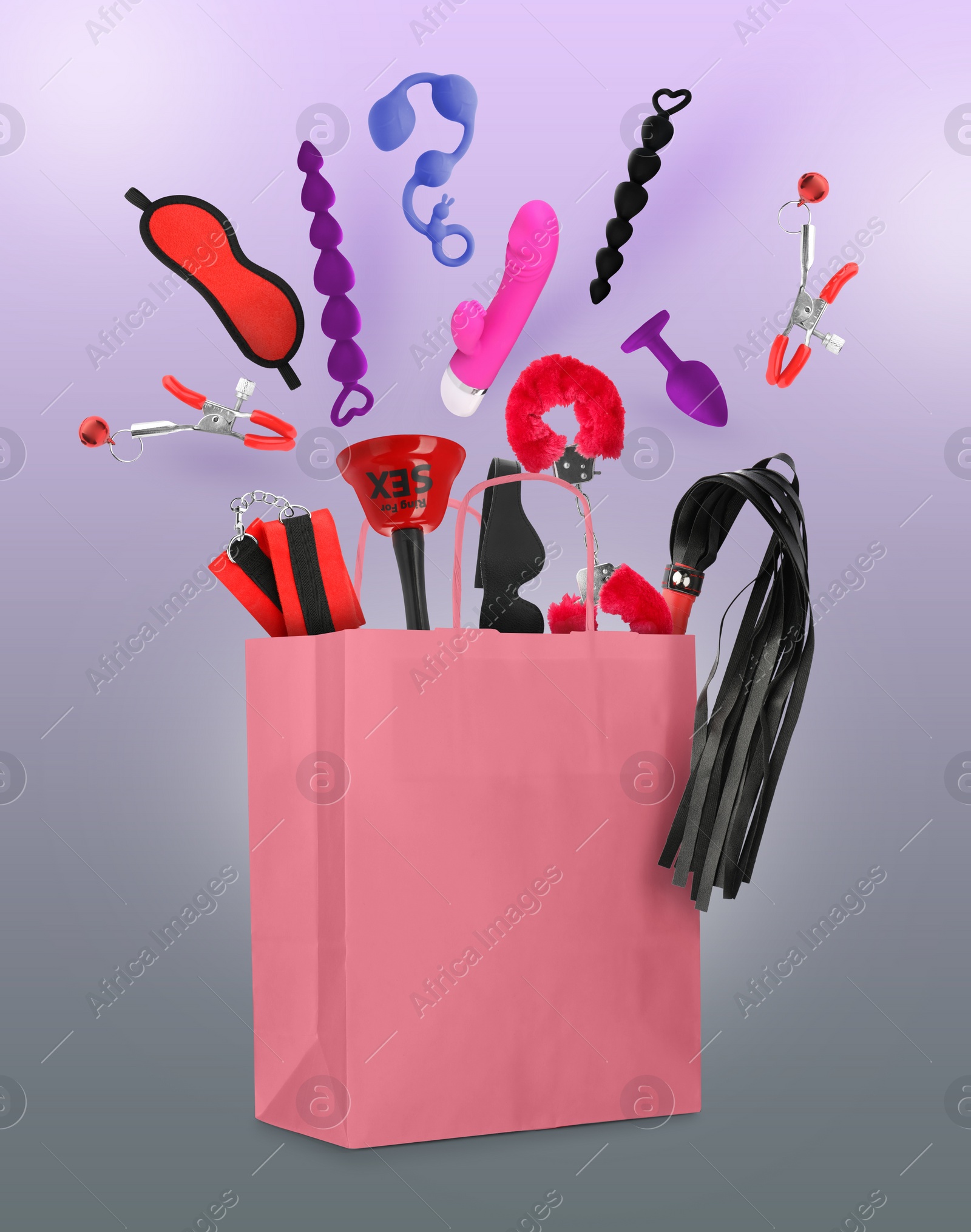 Image of DIfferent sex toys and accessories falling into paper shopping bag on color background