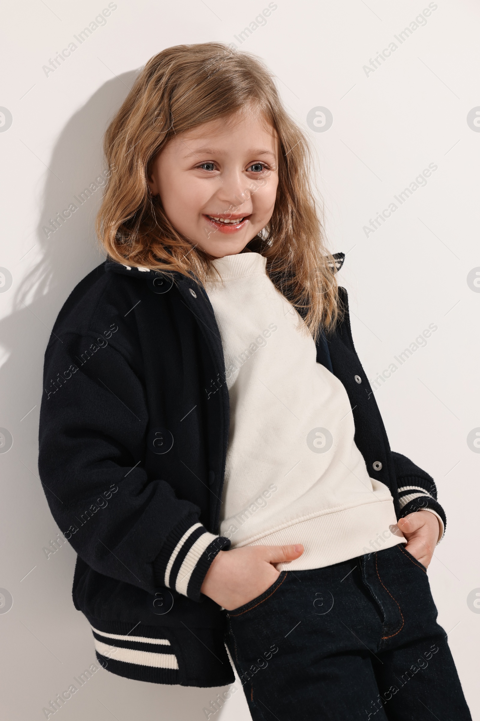 Photo of Fashion concept. Stylish girl posing on white background