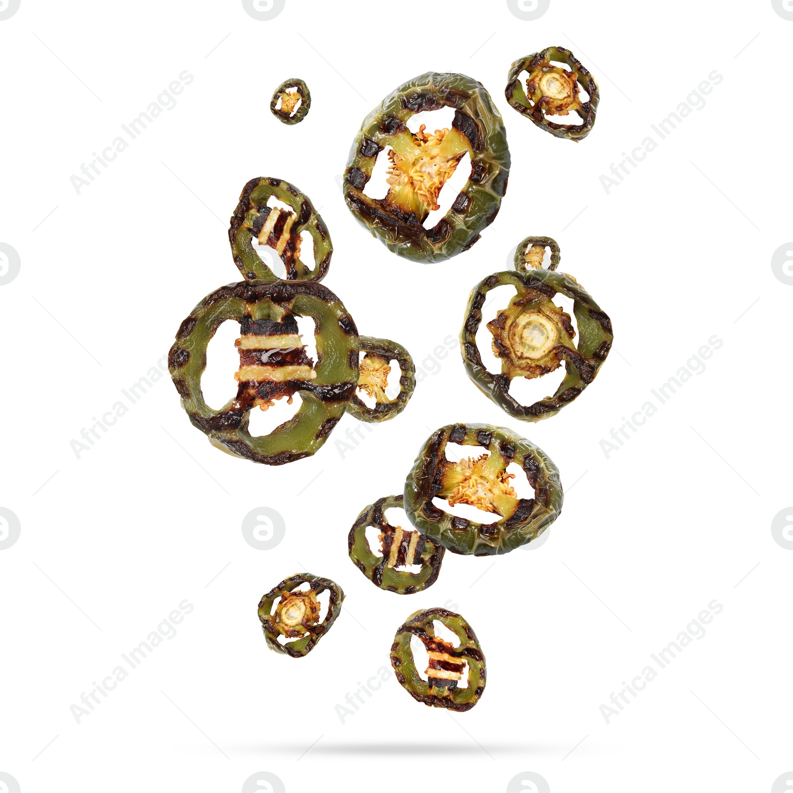 Image of Slices of grilled bell peppers in air on white background