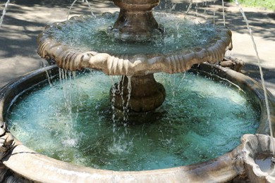 Photo of Beautiful view of fountain in park on sunny day