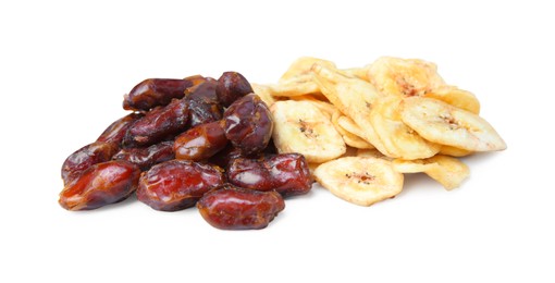 Tasty dried bananas and dates on white background