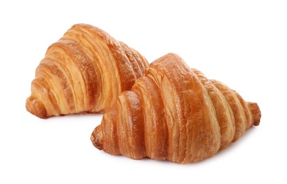 Photo of Delicious croissants isolated on white. Fresh pastries
