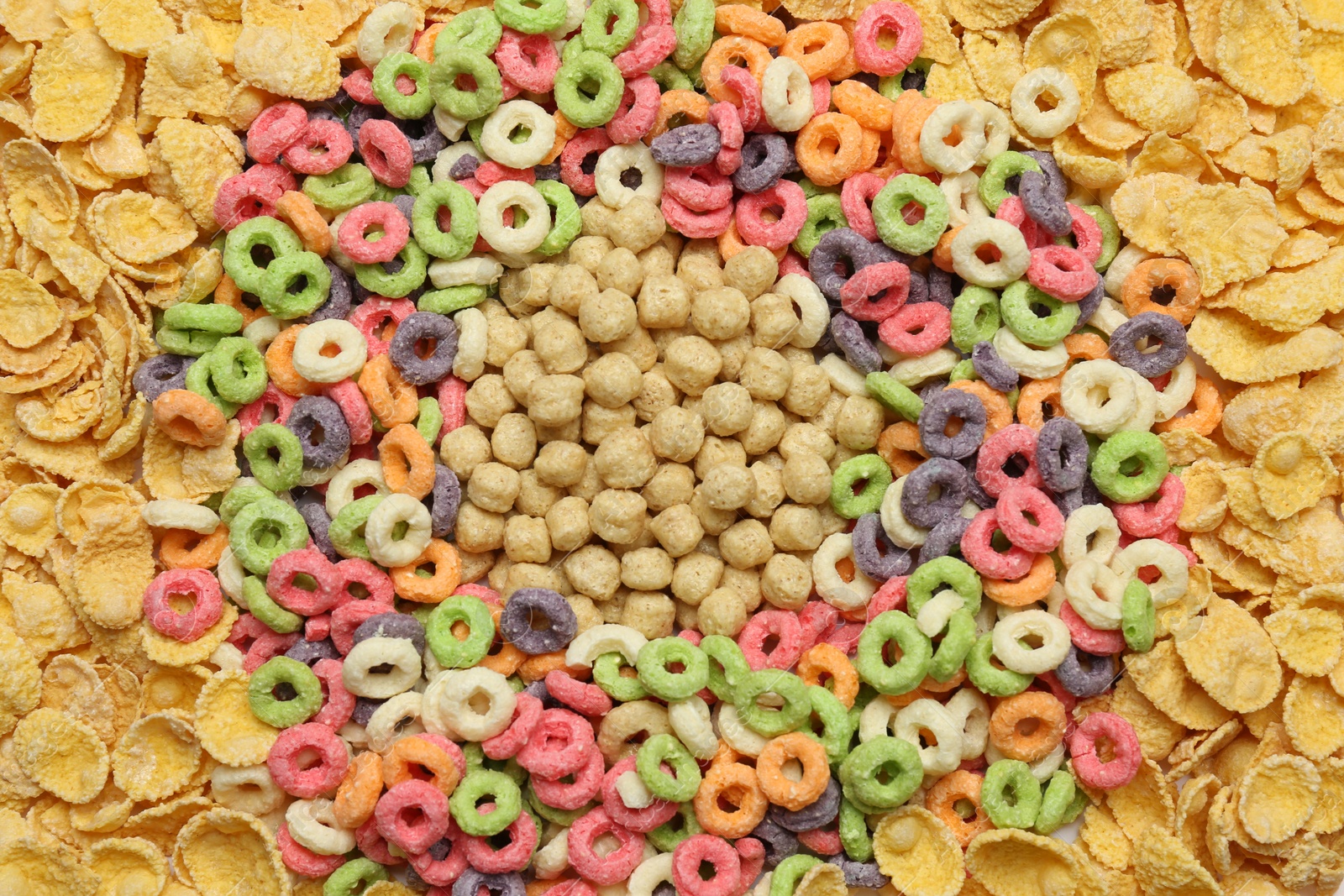 Photo of Different types of dry breakfast as background, top view