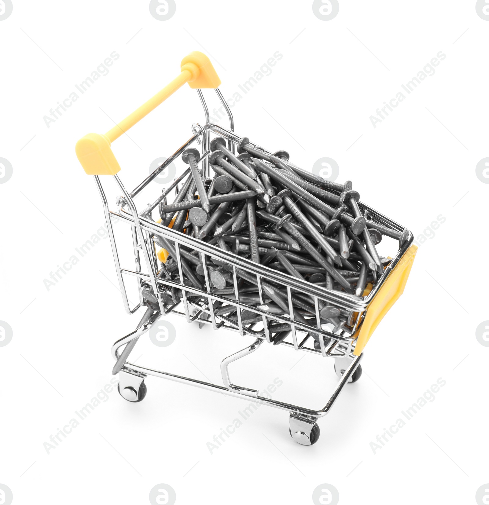 Photo of Metal nails in shopping cart isolated on white