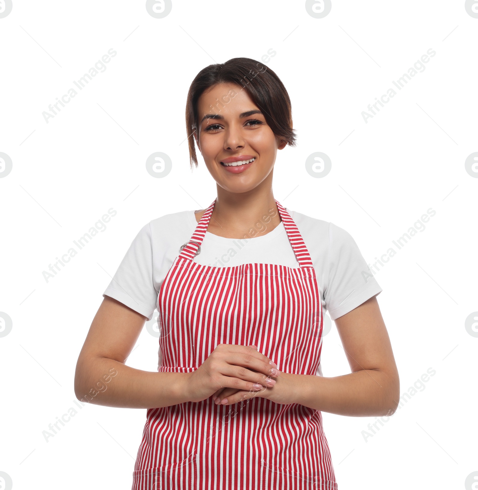 Photo of Young woman in red striped apron on white background