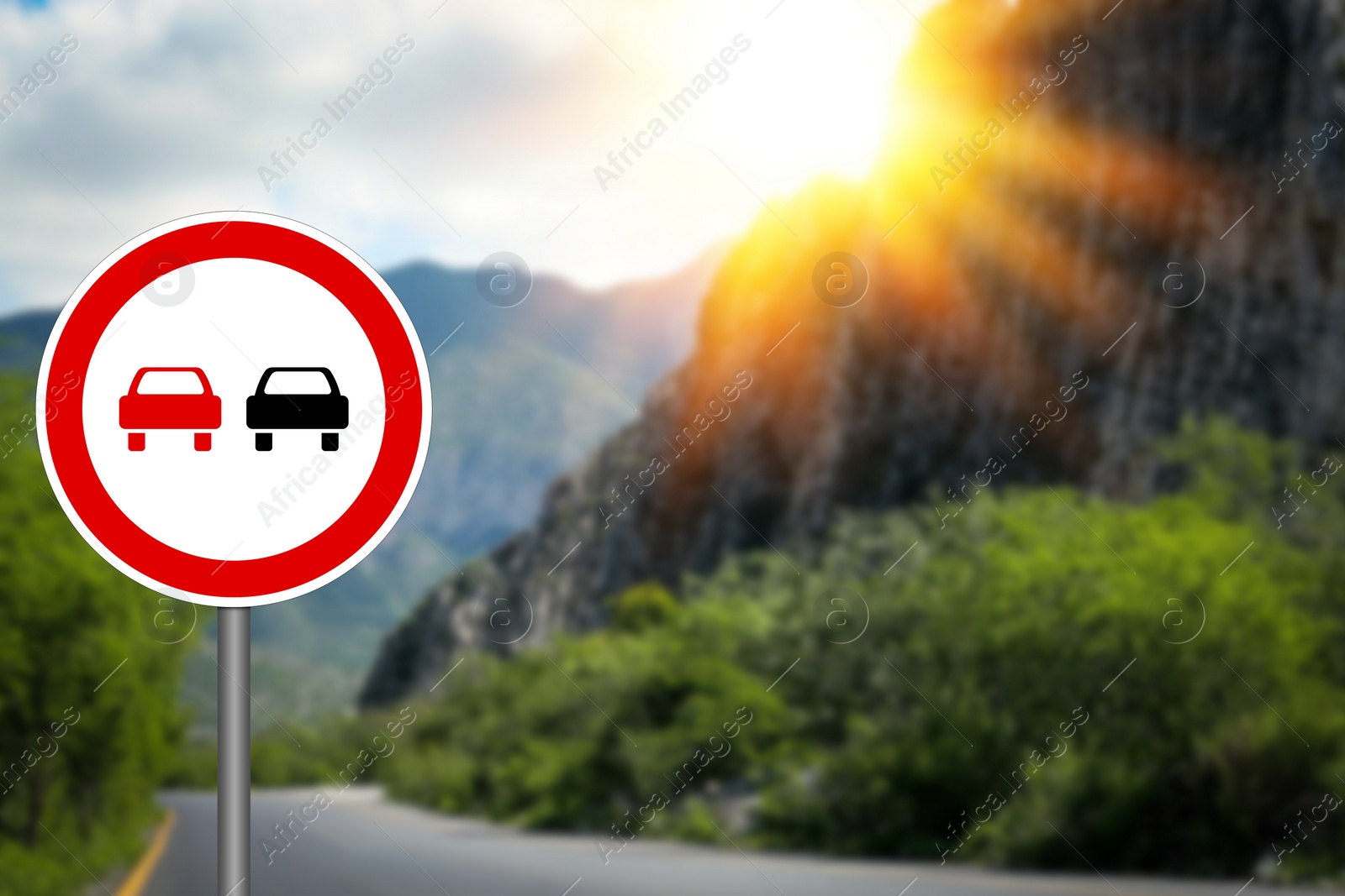 Image of No Overtaking road sign on highway, space for text