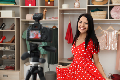 Fashion blogger recording new video in room