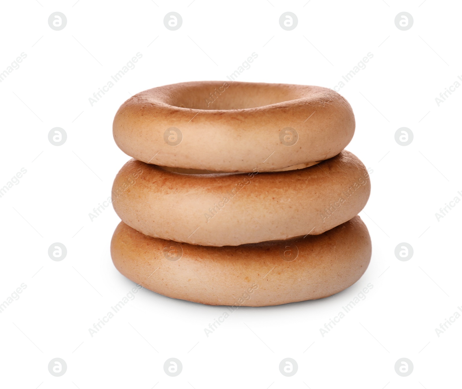 Photo of Tasty dry bagels (sushki) isolated on white