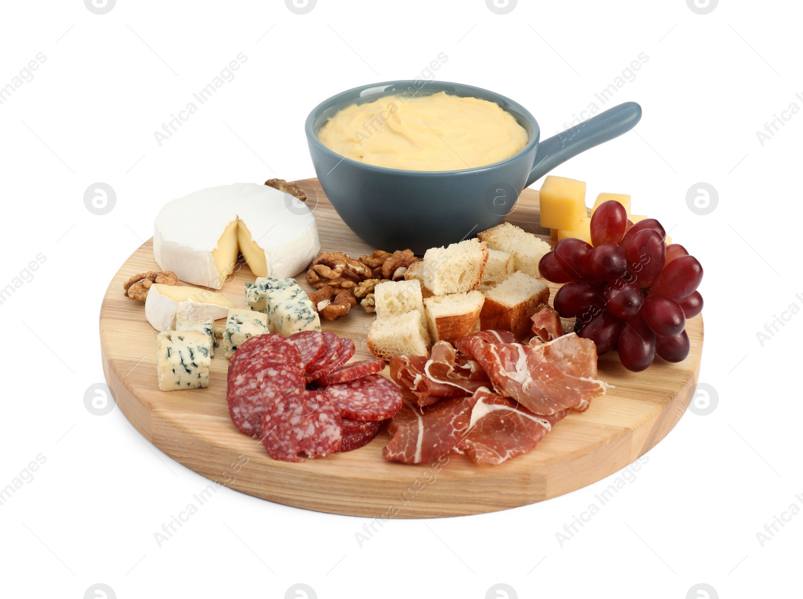 Photo of Fondue with tasty melted cheese and different snacks isolated on white