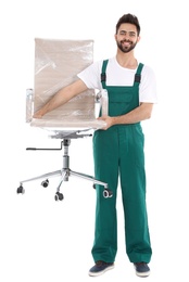 Photo of Young worker carrying office chair isolated on white. Moving service