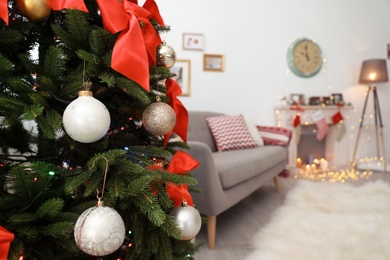 Beautiful Christmas tree in decorated living room